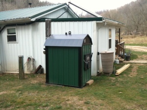 Outdoor wood furnace is  only set in place. There is much more that needs to be done.